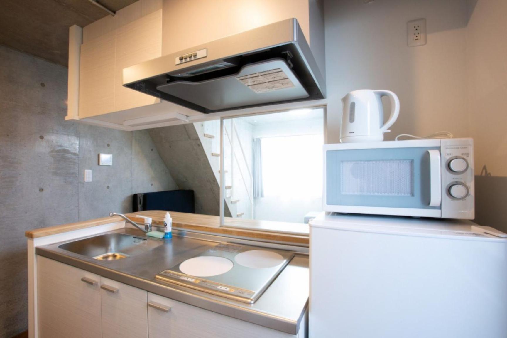 Laffitte Hirai Condominium Hotel Токио Номер фото